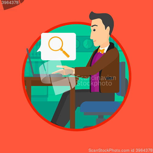 Image of Businessman working on his laptop.