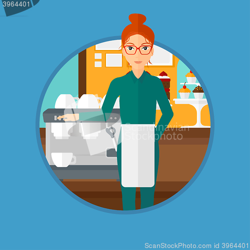 Image of Barista standing near coffee machine.