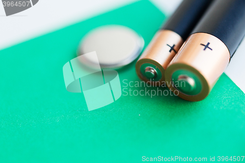 Image of close up of green alkaline batteries