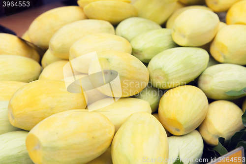 Image of peeled mango at street market