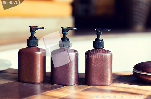 Image of liquid soap or body lotion set at hotel bathroom