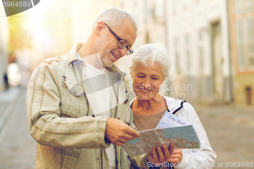 Image of senior couple on city street