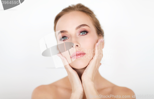 Image of beautiful young woman face and hands