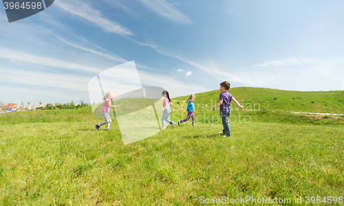 Image of group of happy kids running outdoors