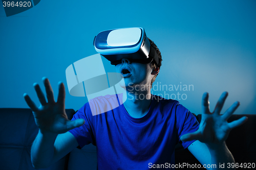 Image of Man using VR glasses