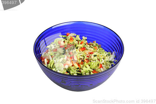 Image of Vegetable Salad in blue salad bowl on white