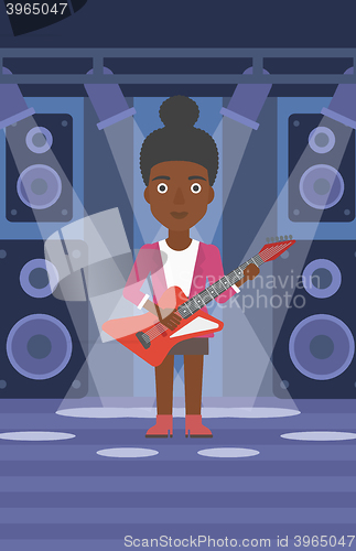 Image of Musician playing electric guitar.