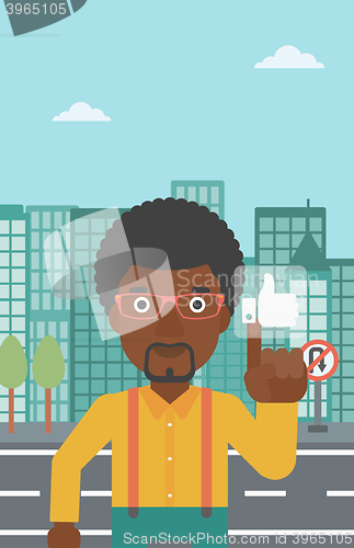 Image of Man pressing like button.