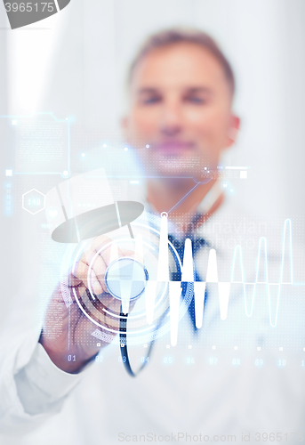 Image of male doctor with stethoscope and cardiogram