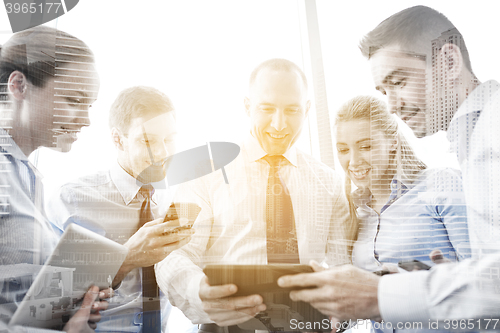 Image of business people with tablet pc and smartphones