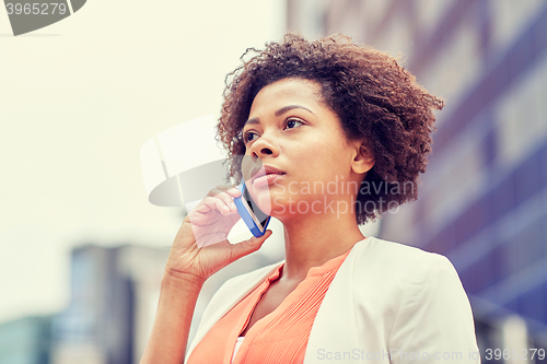 Image of african businesswoman calling on smartphone