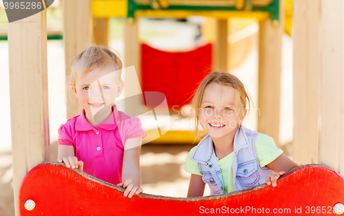 Image of happy girls on children playground