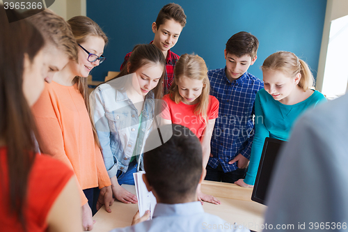 Image of group of students and teacher at school classroom