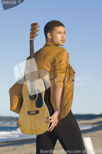Image of Beach Guitarist