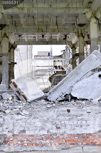 Image of Pieces of Metal and Stone are Crumbling from Demolished Building Floors