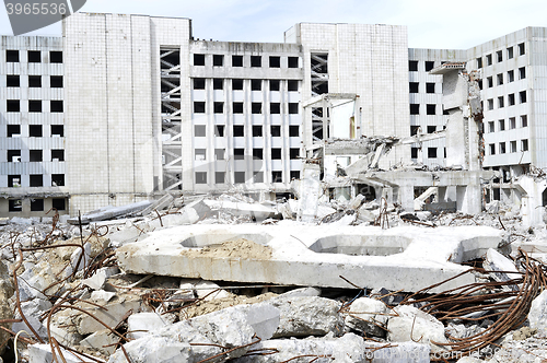 Image of Pieces of Metal and Stone are Crumbling from Demolished Building Floors