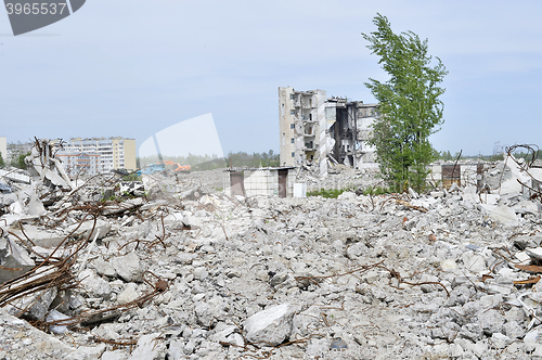 Image of Pieces of Metal and Stone are Crumbling from Demolished Building Floors