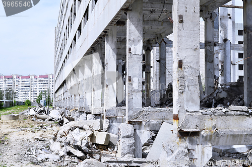 Image of Pieces of Metal and Stone are Crumbling from Demolished Building Floors