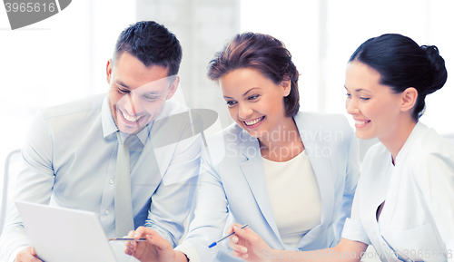 Image of business team having discussion in office