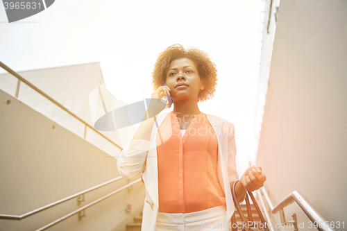 Image of african businesswoman calling on smartphone