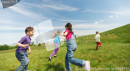 Image of group of happy kids running outdoors