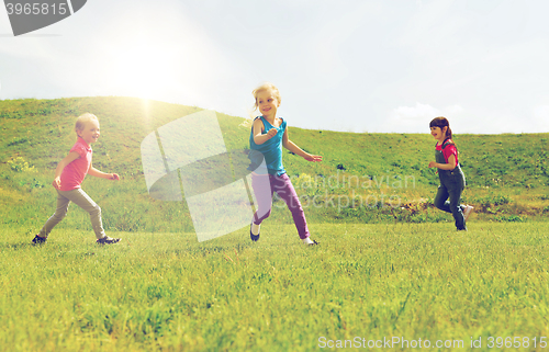 Image of group of happy kids running outdoors