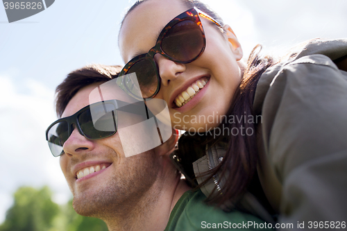 Image of happy couple having fun outdoors