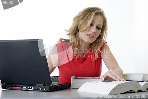 Image of Woman doing homework