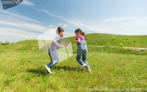 Image of group of happy kids running outdoors