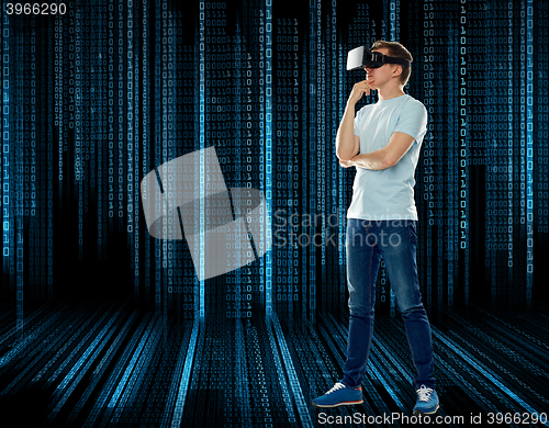 Image of happy man in virtual reality headset or 3d glasses