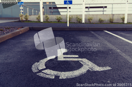 Image of car parking road sign for disabled outdoors