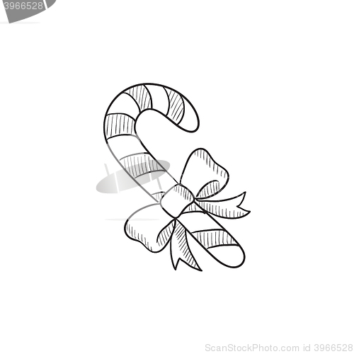 Image of Candy cane with christmas decoration sketch icon.