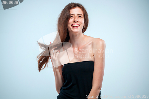 Image of The young woman\'s portrait with happy emotions