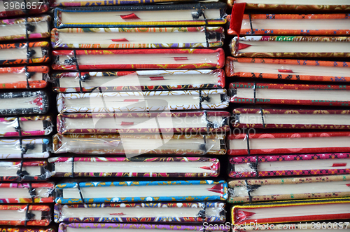 Image of Stack of colorful notebooks 