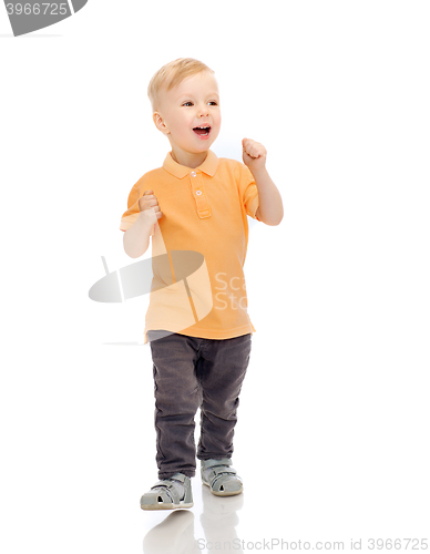 Image of happy little boy in casual clothes