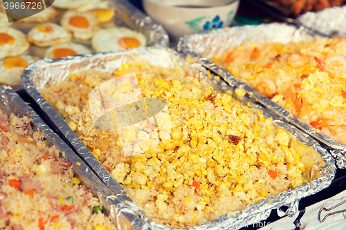 Image of wok dish at street market