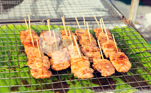 Image of meat grill at street market