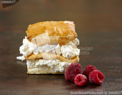 Image of layered baked dessert with cottage cheese cream