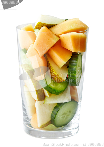 Image of glass of fruit and vegetable pieces