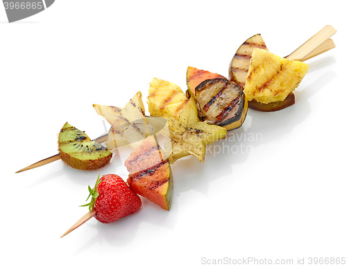 Image of grilled fruit pieces on skewer