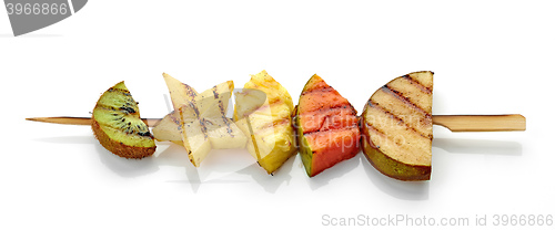 Image of grilled fruit pieces on skewer