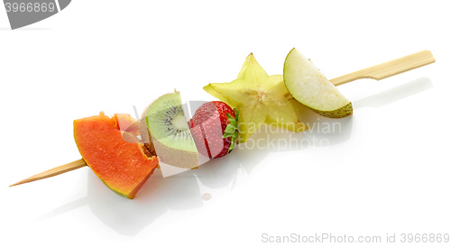 Image of fresh berries and fruit pieces on skewers