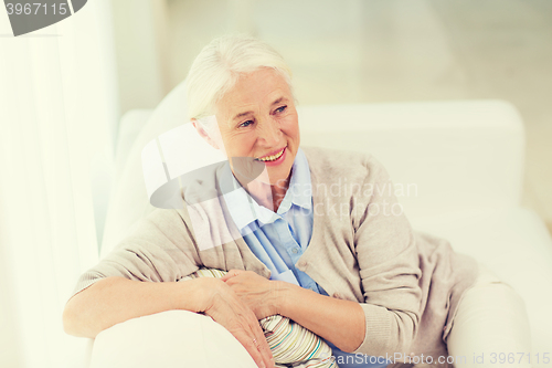 Image of happy senior woman face at home