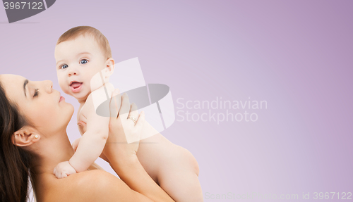 Image of happy mother holding adorable baby