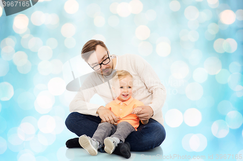 Image of happy father and little son