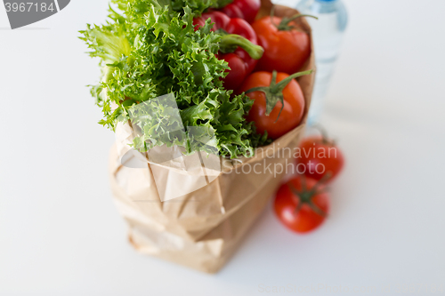 Image of basket of fresh ripe vegetables at kitchen