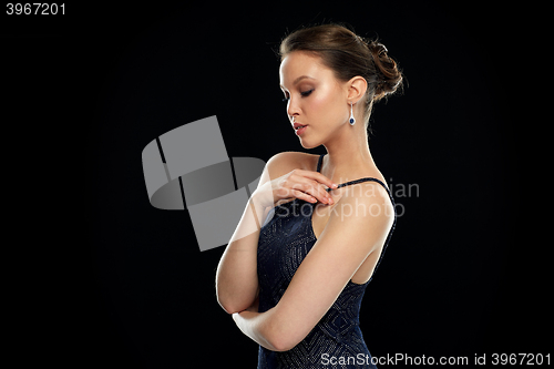 Image of beautiful young asian woman with diamond earring