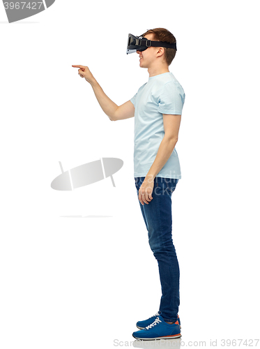 Image of happy man in virtual reality headset or 3d glasses