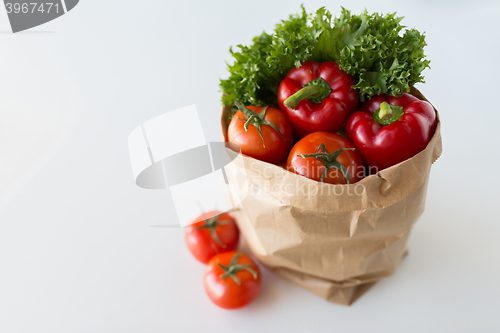 Image of basket of fresh ripe vegetables at kitchen