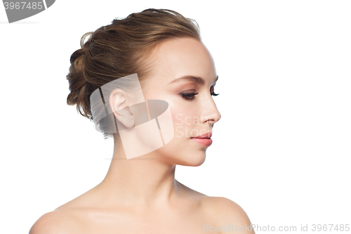 Image of beautiful young woman face over white background